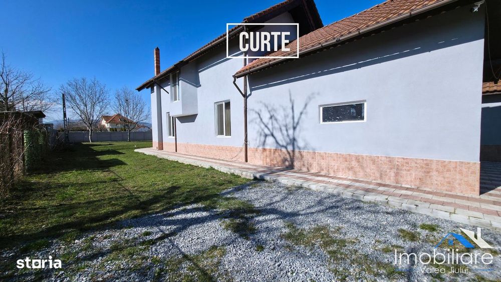 Casă spațioasă de vânzare – Hațeg | Zonă centrală | Teren 1.400 mp