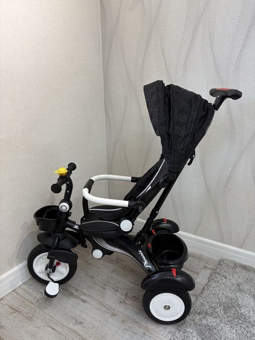 Трехколесный велосипед с ручкой