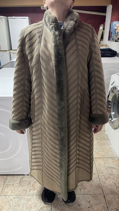 Haină damă cu blană naturală – elegantă, calduroasa top