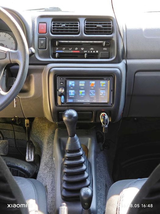 Autoturism SUZUKI Jimny  4WD