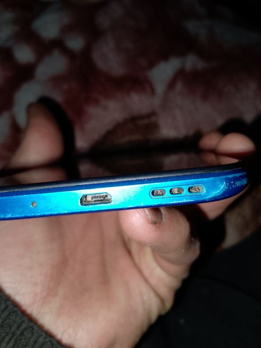 Redmi 9 xotirasi 32  kamera 13 mp  rangi koʻk  ime qilingan