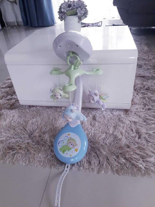 Carusel muzical patut bebe Fisher Price cu lumini, sunete
