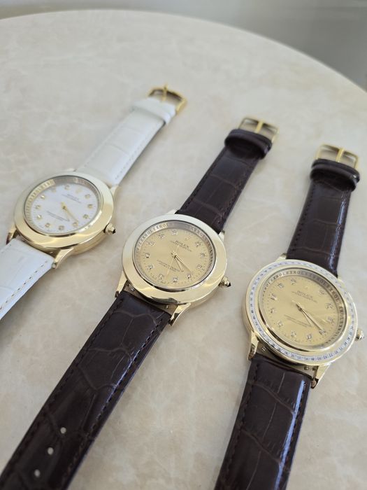 Продам золотые Ролексы новой модели с тремя видами циферблата.