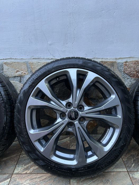 Джанти с гуми 18” 5х108 Titan