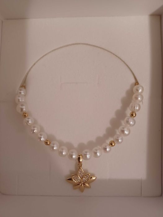 Vând colier elegant din perle de cultură.