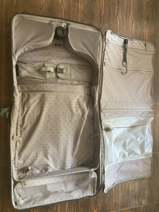 Troller samsonite , stare buna,dimensiuni 59/59/25 cm.