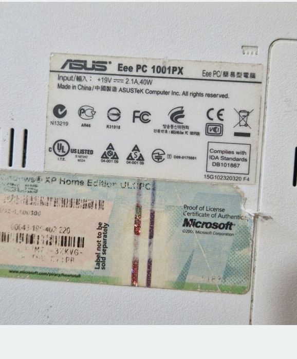 Mini laptop Asus cu mufa de încărcare înlocuită