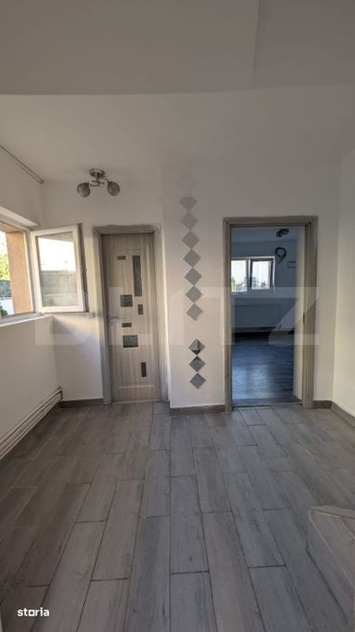 Casa cu 2 camere si mansarda ,plus bucatarie de vara .