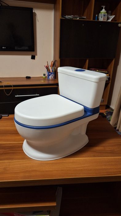 Olita copii in forma de wc .