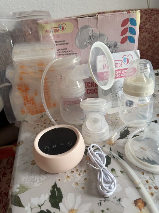 Электронный  молокоотсос двойной как новый