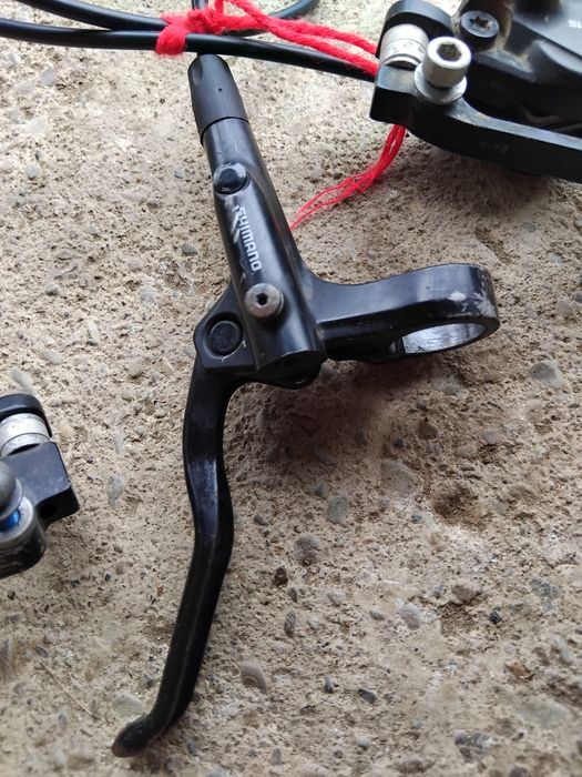 Vând set complet de frâne hidraulice Shimano (față + spate), utilizat.