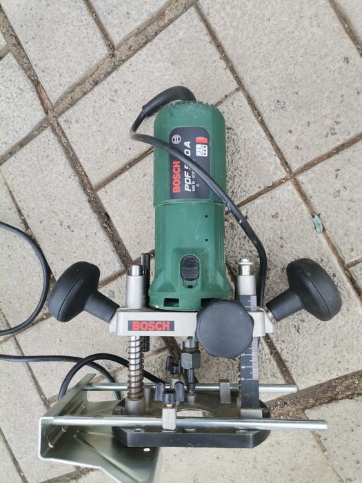 Bosch POF 500 A оберфреза/прав шлайф с плот 500 W