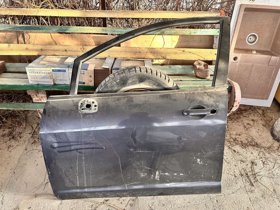 Дверь ниссан тиида