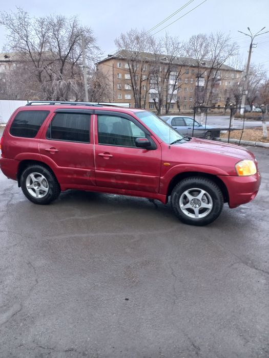 Проас Mazda tribute