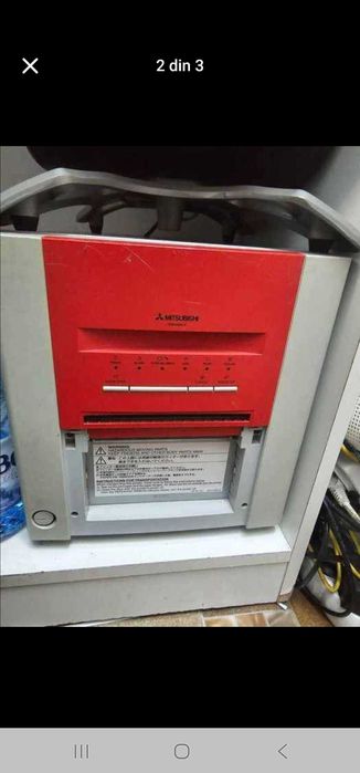 3 imprimante foto mitsubishi si o statie se lucru