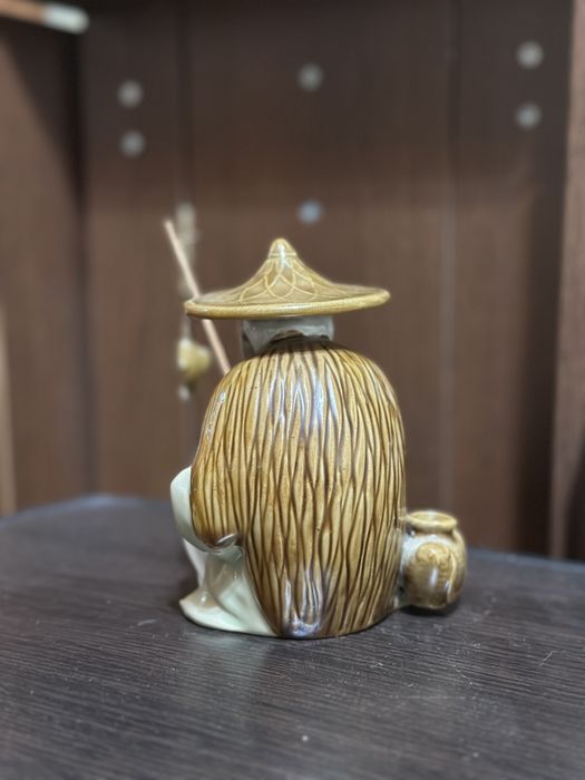 bibelou chinezesc cu undita si peste