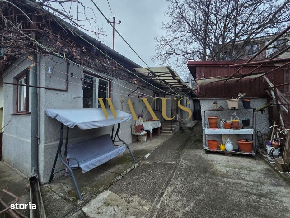 Casa de vanzare cu 2 camere si curte generoasa in zona Gruia