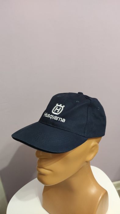 Нова шапка Husqvarna