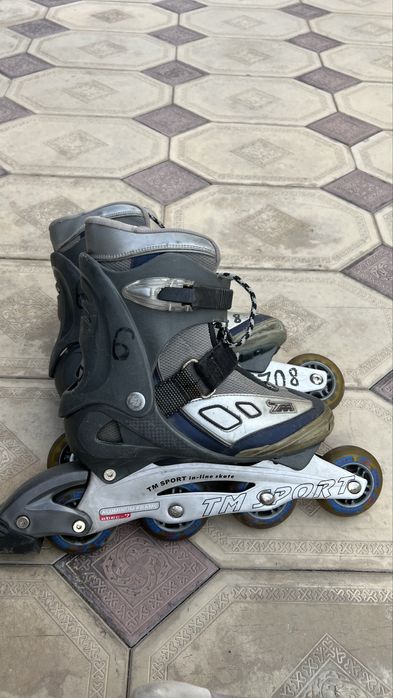 Роликовые коньки