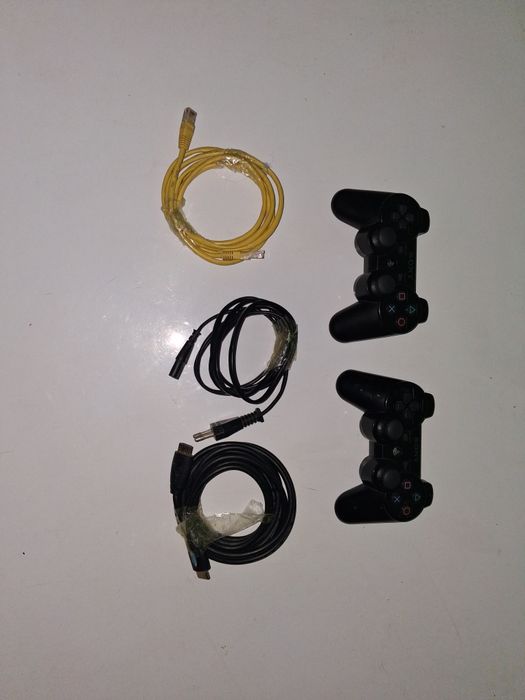 PS3 + 40 JOCURI GRATIS + 2 manete