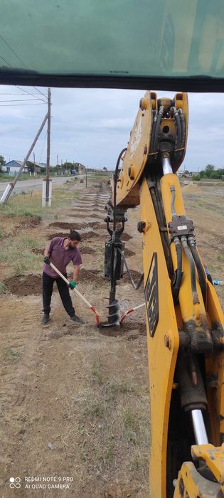Услуги экскаватора-погрузчика