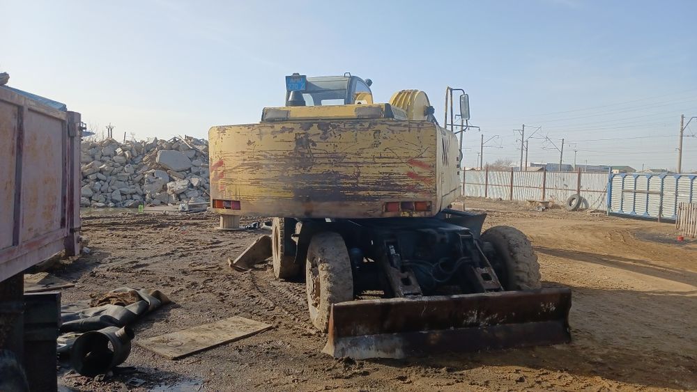 Экскаватор колёсный