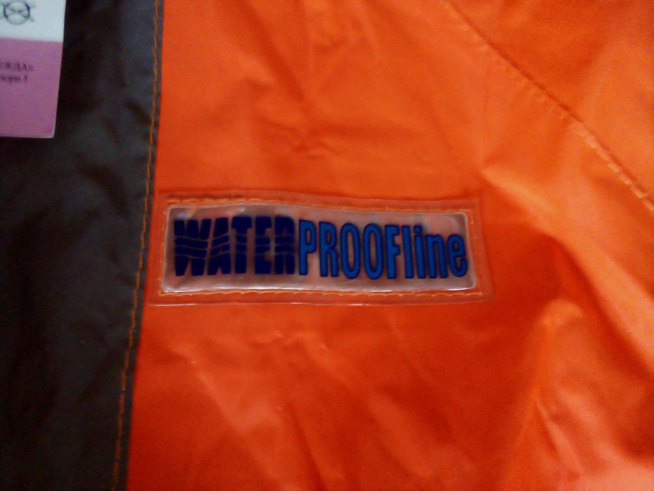 Продам новый плащ,спецодежда,со светящимися полосами.