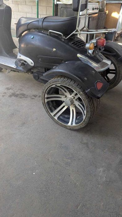 Электрический трицикл