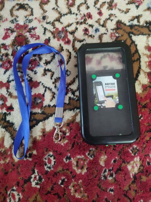 Telefon ushlagich velosiped uchun yomgʻirli havolarga zoʻr