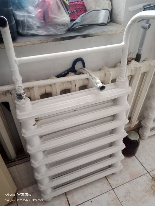 Продам чугунные батареи.