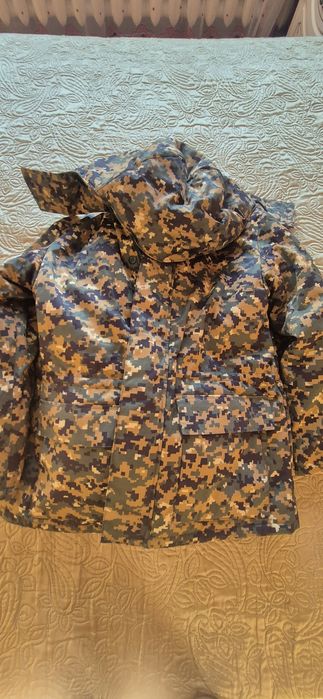 Продам комуфлированный зимний костюм