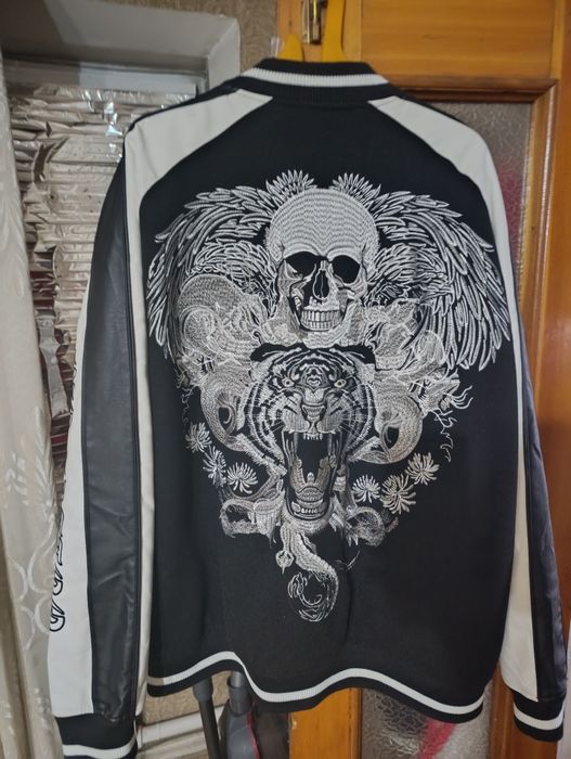 Продам бомбер новый