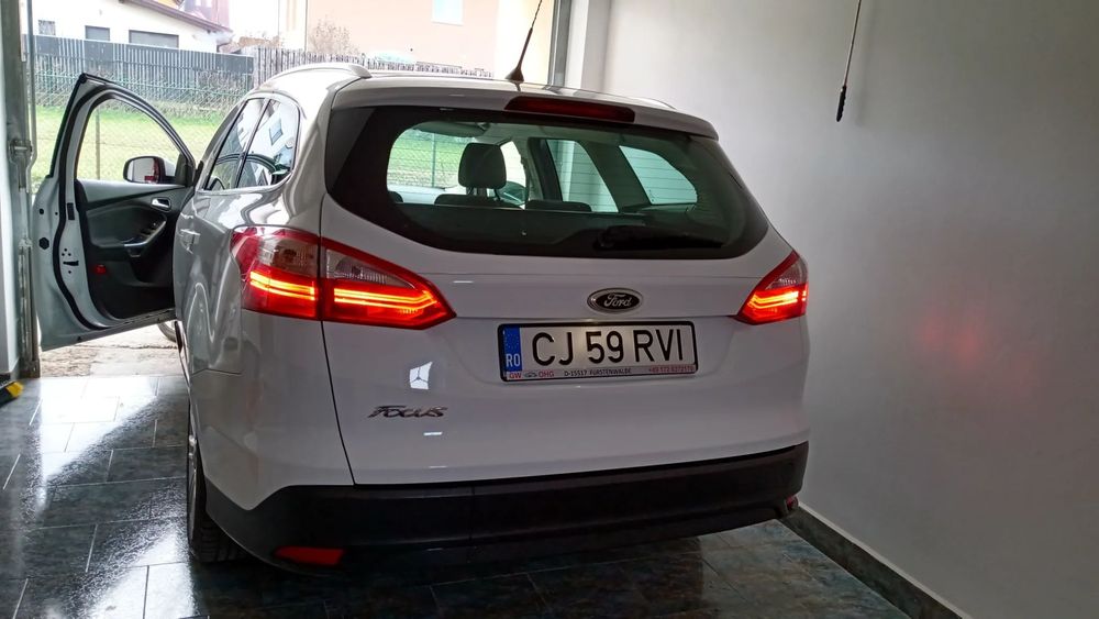 Ford Focus Motor1,6 putin pretentios istoric Ford,Titanium, Gps Eu si Rom, Xenon.