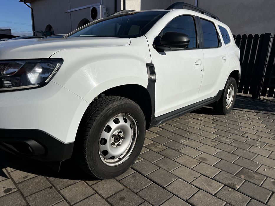 Jante Tabla cu anvelope iarna Duster