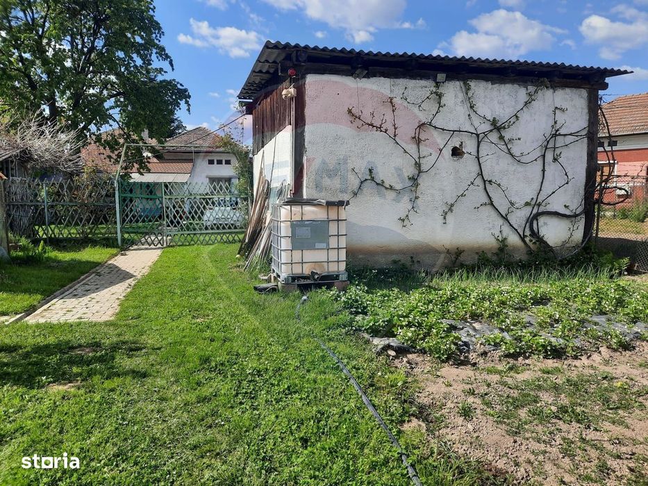 Casă langa Fagaras cu teren de 1836mp si parau in spatele curtii