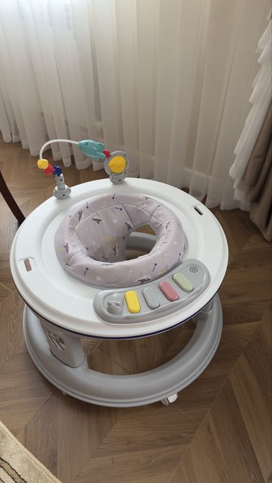 Детские ходунки с игрушками и музыкальные