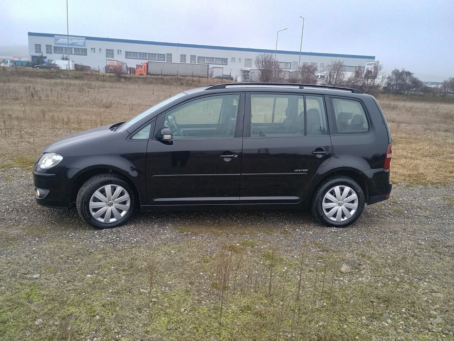 Touran 1.9.  7 locuri  An 2009