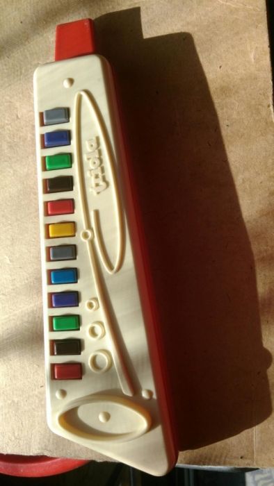 Триола,музикален инструмент