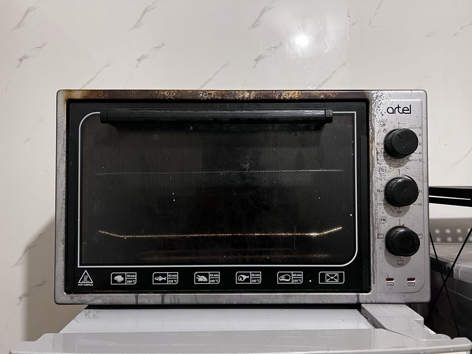 Продается духовка  Artel MD 3618 E серый, черный