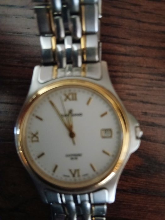 Ceas elvetian Candino Sapphire 50 M model 2086 
bratara metalica.
Ceas