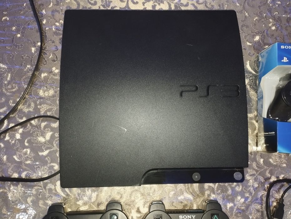Продам PlayStation 3 Slim