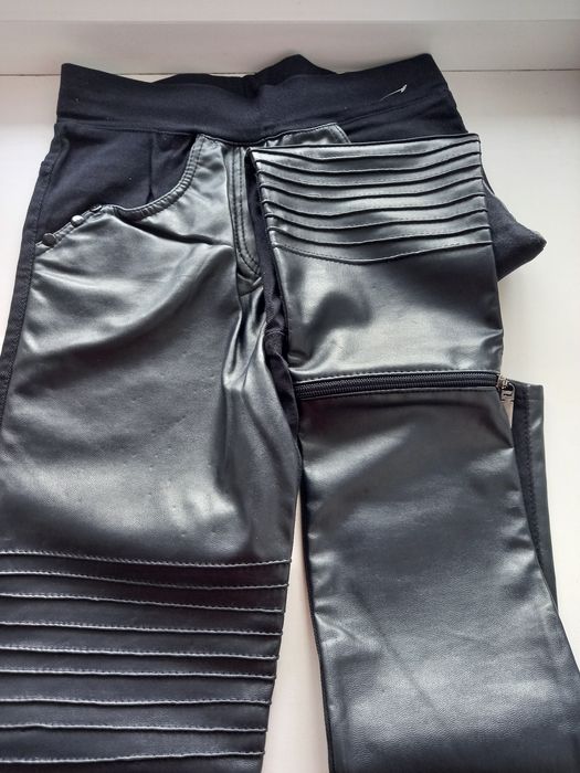 Новые брюки 40 р