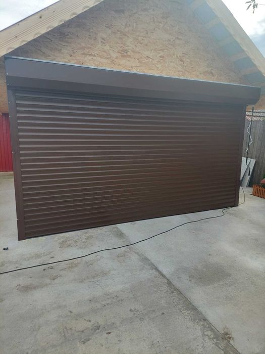 Usi garaj rulou=actionare electrica