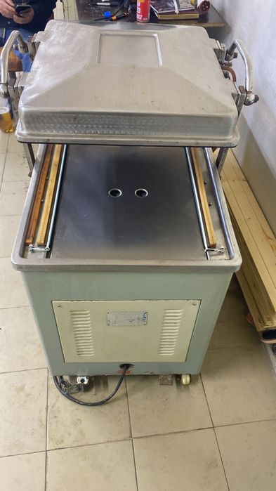 Вакуумный упаковщик