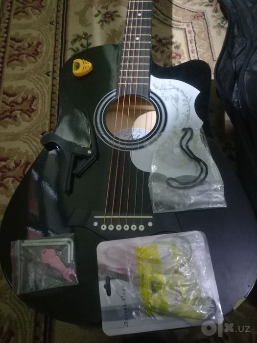 Akustik gitara 850 000
