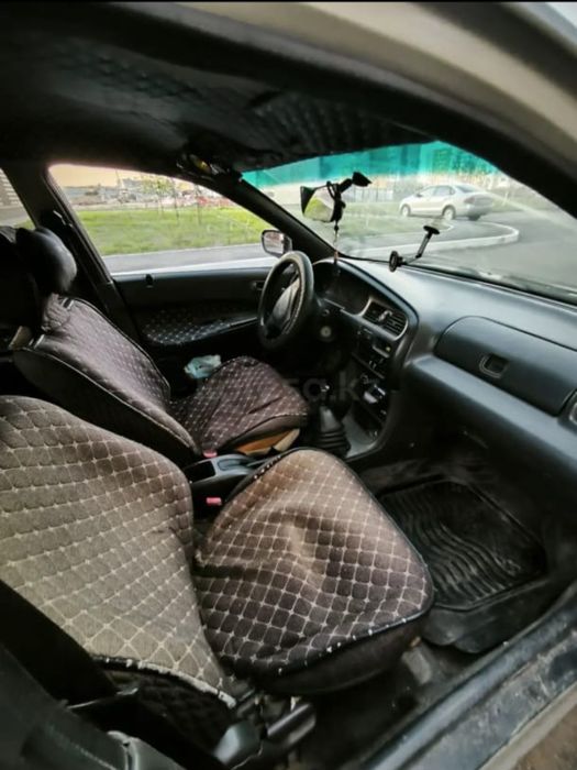 Продав автомобиль Mazda 323ba94  1.3