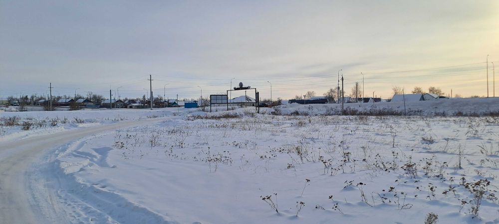 Продам зем. участок вдоль трассы возле кафе "Пристань"