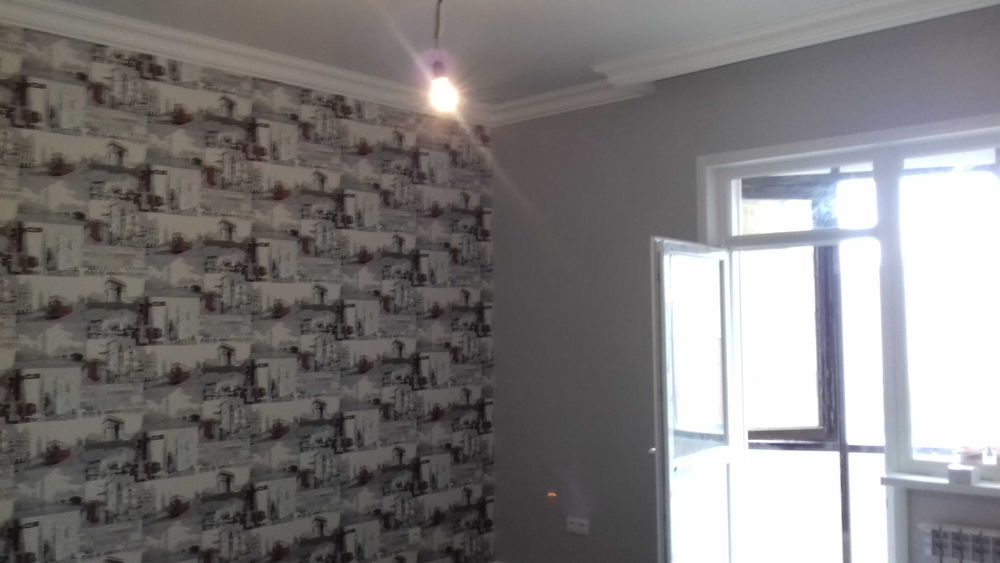 Поклейка обоев  закатка