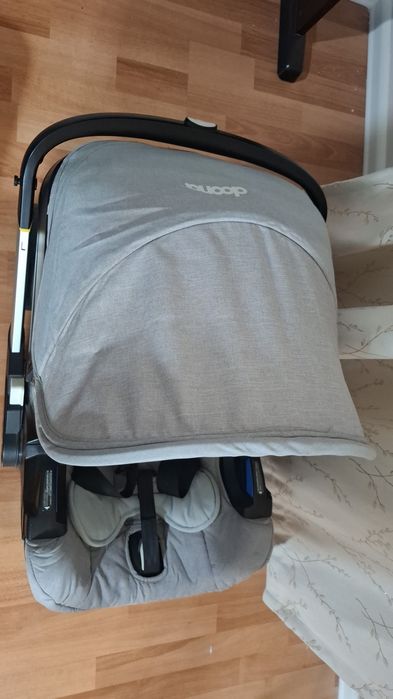 Продам кодяску + автокресло Doona +
