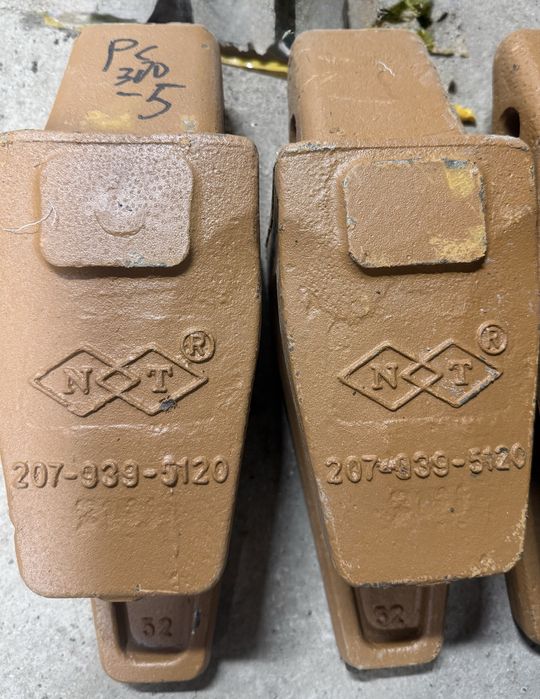 Продам коронки зубья адаптера на экскаваторы